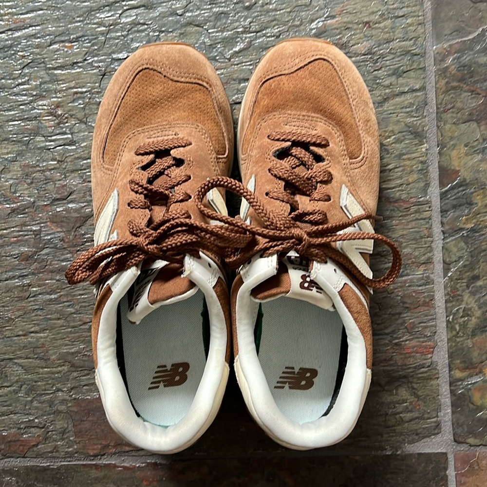 Women’s brown suede New Balance sneakers